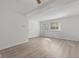 Bright living room featuring white walls, wood-look vinyl flooring, and large windows at 3705 Lima Ct, Indianapolis, IN 46227