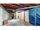 Unfinished basement with exposed ductwork and concrete walls offers a blank canvas for customization at 4213 N Audubon Rd, Indianapolis, IN 46226