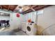 Functional laundry area with modern washer and dryer units in the basement at 4213 N Audubon Rd, Indianapolis, IN 46226