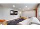 Bright living room showcases hardwood floors, modern lighting, and a relaxing seating arrangement at 4213 N Audubon Rd, Indianapolis, IN 46226