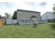 Spacious backyard featuring a large deck, well-maintained lawn and privacy fence at , Greenwood, IN 46143