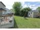 Backyard featuring a deck, lush lawn and shed at , Greenwood, IN 46143
