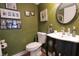 Cozy bathroom features a unique vanity and framed artwork at , Greenwood, IN 46143