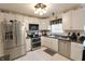 Bright kitchen features stainless steel appliances and plenty of white cabinets at , Greenwood, IN 46143
