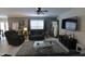 Open-concept living room offers bright white ceramic tile, modern furniture and lots of natural light at , Greenwood, IN 46143