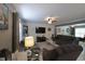 Open-concept living room offers bright white ceramic tile, modern furniture and lots of natural light at , Greenwood, IN 46143