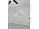 Neutral bedroom featuring carpet, a window with natural light, and a ceiling fan at 4337 N Audubon Rd, Indianapolis, IN 46226