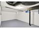 Unfinished basement area with painted walls, providing a blank canvas for various uses at 4447 N College Ave, Indianapolis, IN 46205