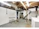 The basement shows mechanicals, laundry area, and staircase at 4447 N College Ave, Indianapolis, IN 46205