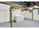 Basement laundry area with washer and dryer hookups, perfect for functionality and storage at 4447 N College Ave, Indianapolis, IN 46205
