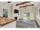 Stylish living room with a fireplace, vaulted ceiling, and sliding doors to the yard at 4447 N College Ave, Indianapolis, IN 46205