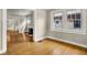 Cozy living area showcasing hardwood floors, natural light, and a fireplace at 4447 N College Ave, Indianapolis, IN 46205