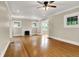 Bright living room featuring hardwood floors and classic fireplace at 4447 N College Ave, Indianapolis, IN 46205