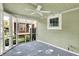 Enclosed screened porch that has view of the back yard and house at 4447 N College Ave, Indianapolis, IN 46205