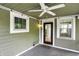 Screened in porch with ceiling fan and access to the home's interior at 4447 N College Ave, Indianapolis, IN 46205