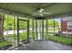 Inviting screened porch with open views of neighborhood, perfect for relaxation at 4447 N College Ave, Indianapolis, IN 46205