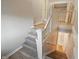 The staircase features white railing and neutral walls at 4447 N College Ave, Indianapolis, IN 46205