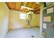 Unfinished basement area ready for customization with painted floor and open ceiling at 4527 Peachwood Ct, Indianapolis, IN 46235