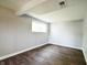 Bedroom featuring a dark wood floor and a window at 4527 Peachwood Ct, Indianapolis, IN 46235