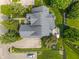 Overhead view of the home's roof, deck, and surrounding yard with trampoline at 4601 Fairhope Dr, Indianapolis, IN 46237