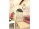 Charming bedroom with a vaulted ceiling, decorative chandelier, and a fun bunk bed at 4601 Fairhope Dr, Indianapolis, IN 46237