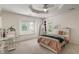 Inviting bedroom with desk, decor, and lots of natural light from the windows at 4601 Fairhope Dr, Indianapolis, IN 46237