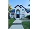 Beautiful two-story home featuring a grand entrance and landscaped front yard at 4601 Fairhope Dr, Indianapolis, IN 46237