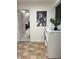 Convenient laundry room with modern appliances and direct access to additional storage at 4601 Fairhope Dr, Indianapolis, IN 46237