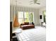 Bright playroom with large windows, comfortable seating, and whimsical decor, perfect for children at 4601 Fairhope Dr, Indianapolis, IN 46237