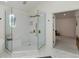 Modern shower with glass enclosure, dual shower heads, and stylish tile work at 4601 Fairhope Dr, Indianapolis, IN 46237