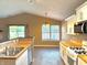 Well-lit kitchen featuring stainless steel appliances, wood counters, and an adjacent breakfast area at 4947 Peony Pl, Indianapolis, IN 46254