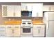 A well-lit kitchen with stainless steel appliances and wood countertops at 4947 Peony Pl, Indianapolis, IN 46254