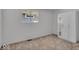 Neutral bedroom with large window, closet, and plush carpeting at 4956 W 11Th St, Speedway, IN 46224
