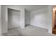 Bright bedroom featuring neutral carpeting and closet space at 4956 W 11Th St, Speedway, IN 46224