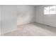 A bedroom featuring neutral carpeting and white walls and natural light from the windows at 4956 W 11Th St, Speedway, IN 46224