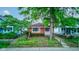 Charming brick home with a well-maintained lawn and mature trees in a residential neighborhood at 4956 W 11Th St, Speedway, IN 46224