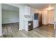 Modern kitchen features new stainless steel appliances, countertops, and ample cabinet space at 4956 W 11Th St, Speedway, IN 46224