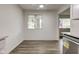 Bright kitchen area with updated stainless steel appliances, and contemporary finishes at 4956 W 11Th St, Speedway, IN 46224