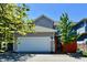 Spacious two-car garage provides ample parking and storage space for vehicles and equipment at 5755 Buskirk Dr, Indianapolis, IN 46216