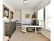 Comfortable home office featuring natural light and ample workspace, perfect for productivity at 5755 Buskirk Dr, Indianapolis, IN 46216