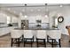 Modern kitchen with a large island, stainless steel appliances, and ample counter space at 5755 Buskirk Dr, Indianapolis, IN 46216