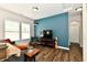 Stylish living room with hardwood floors, ample natural light, and open layout at 5755 Buskirk Dr, Indianapolis, IN 46216