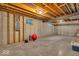 Unfinished basement with exposed ceiling, concrete walls and floor, and window at 5783 Coopers Hawk Dr, Carmel, IN 46033