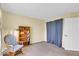Bedroom with carpet, bookcase, chair, and curtains at 5783 Coopers Hawk Dr, Carmel, IN 46033