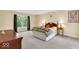 Bedroom with neutral color palette, a window, and an area rug at 5783 Coopers Hawk Dr, Carmel, IN 46033