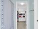 Walk-in closet with shelves and a hanging rod at 5783 Coopers Hawk Dr, Carmel, IN 46033