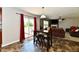 Living area with patio access, bar seating, and a comfortable, inviting layout at 5827 High Grass Ln, Indianapolis, IN 46235