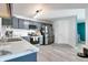 Well-appointed kitchen with stainless steel appliances and gray cabinets at 6190 E Ayrshire Cir, Camby, IN 46113