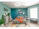 Inviting living room featuring a comfortable couch, shelves, and decor at 6190 E Ayrshire Cir, Camby, IN 46113