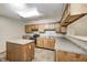 Functional kitchen with an island, stainless steel appliances, and ample cabinet space at 6354 Cotton Bay N Dr, Indianapolis, IN 46254